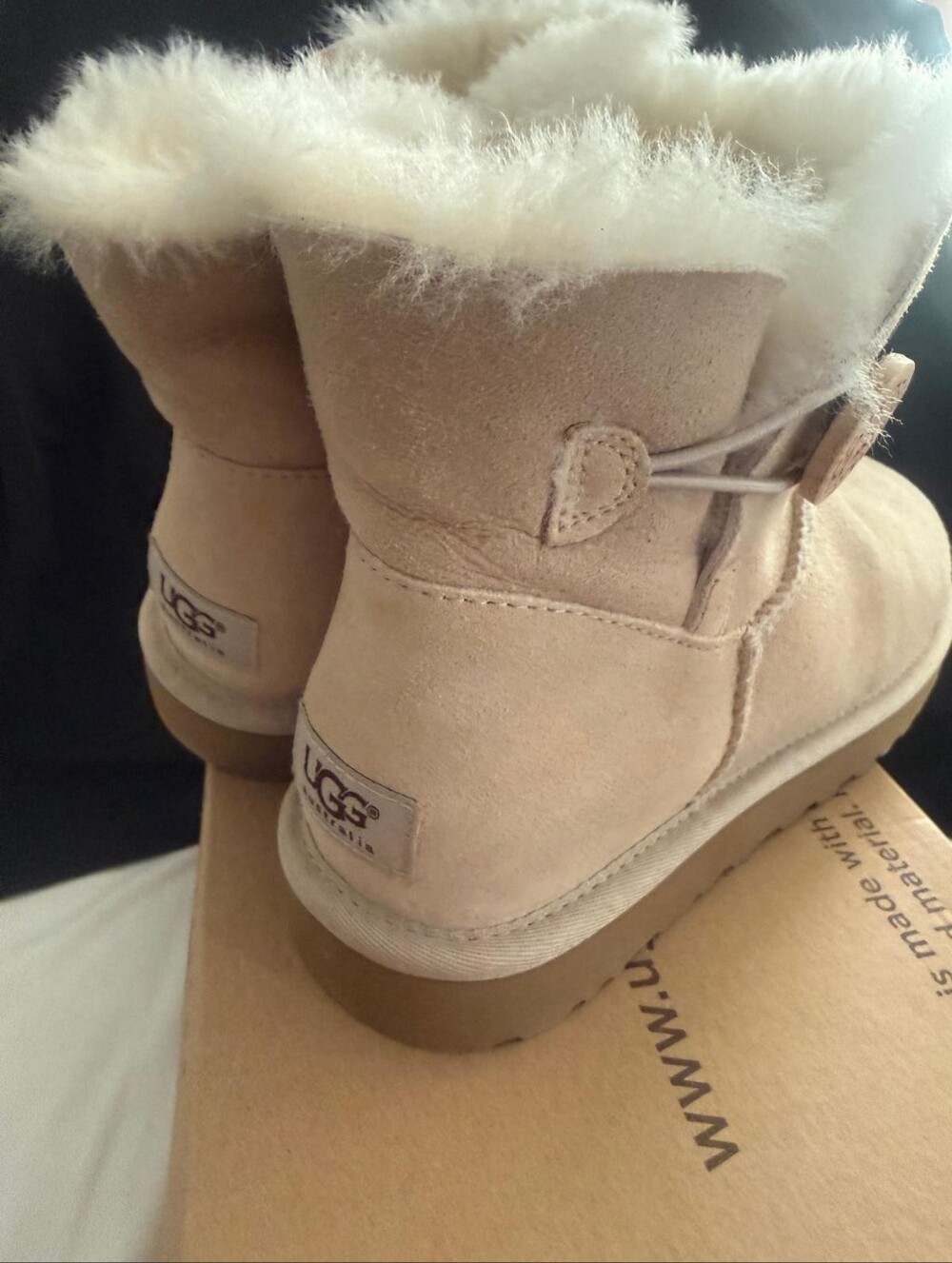 UGG Women's Mini Bailey Button Boot in Sand with Cream Sheepskin